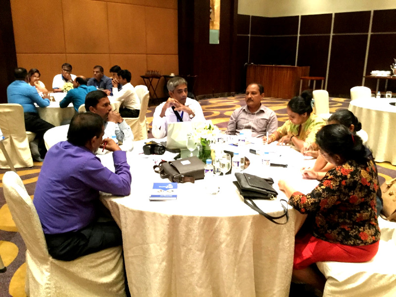 The government sector group having a discussion during the workshop activity